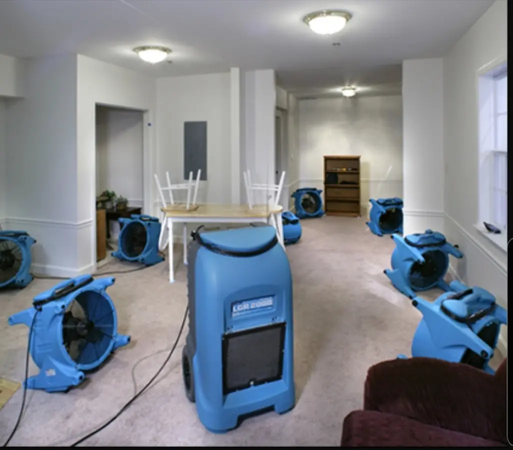 Air movers and dehumidifier setup for Water Extraction & Removal in Muscatine